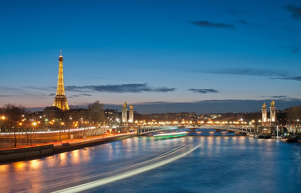 Caen to Paris. Eiffel Tower Timelapse photo showing Eiffel Tower and Pont Alexandre III